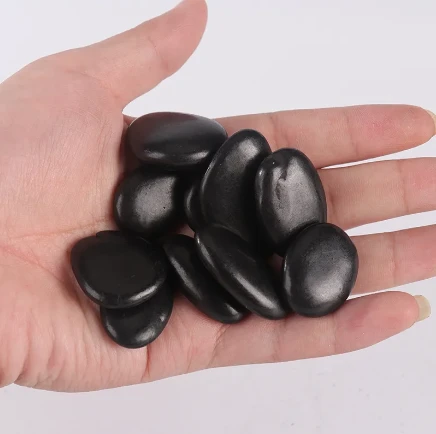Enhancing Outdoor Spaces with Black Pebbles and Gravel