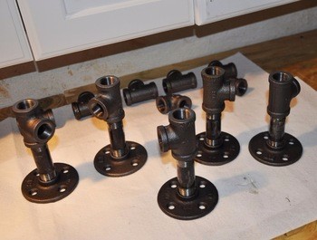DIY bed frame with cast iron pipe fittings