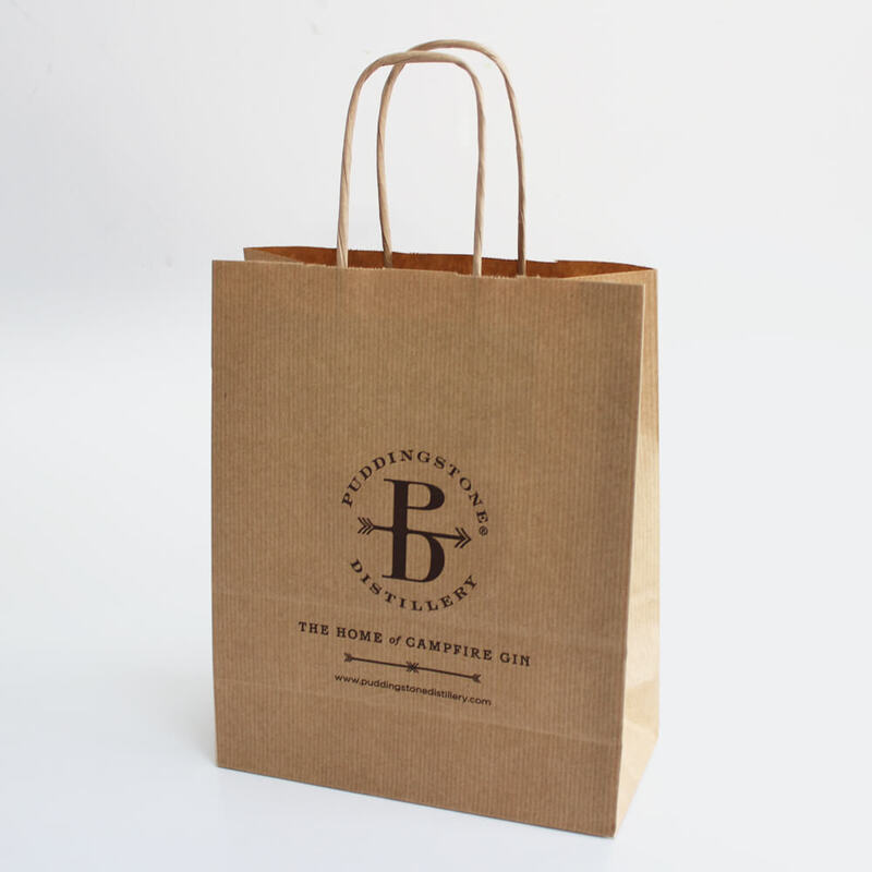 medium_brown_twist_handle_bag_with_print_b05a70c3-1fde-48b1-8f90-90abf927d61b_1000x1000