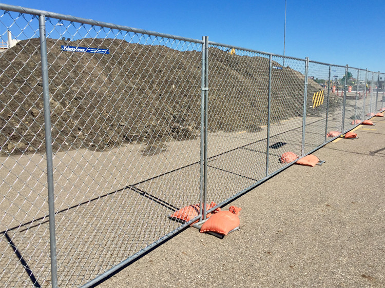 Security barrier made of palisade fencing designed for maximum protection and safety. Security barrier made of palisade fencing designed for maximum protection and safety.